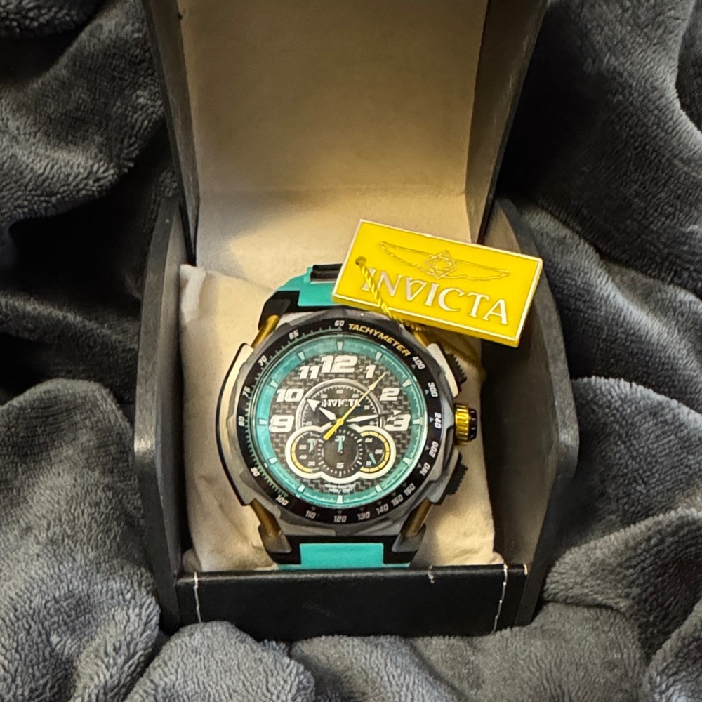 Invicta Men's Watch with Black and Teal Accents